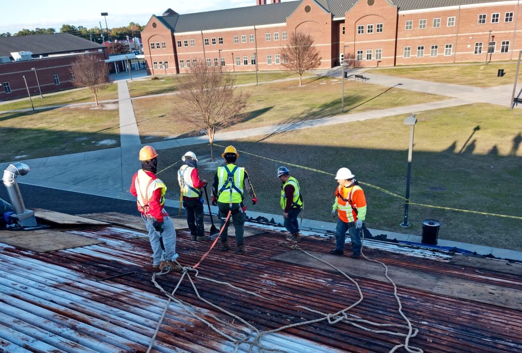 Rusty metal deck commercial roof replacement