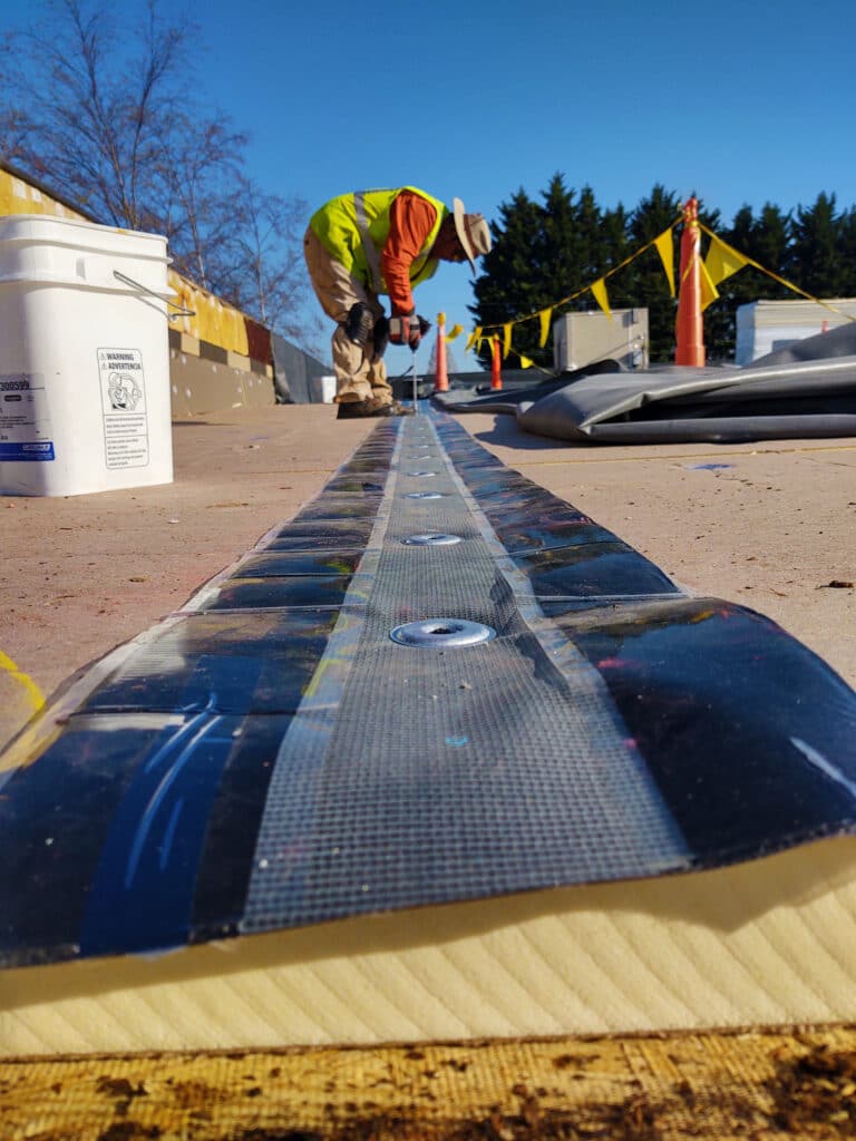 prepping the roof for EPDM rubber membrane