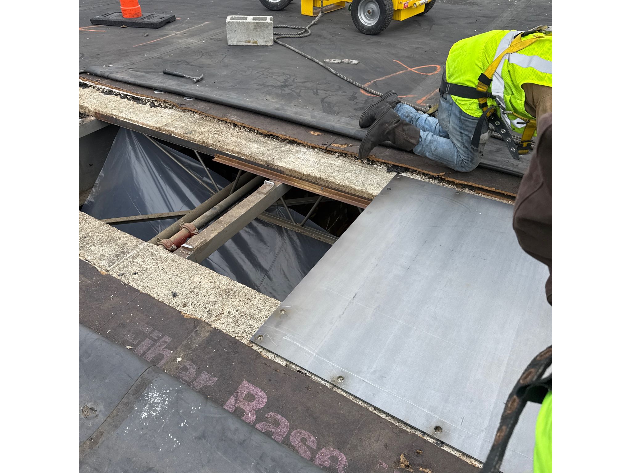 Covering old removed penetration with new roof decking