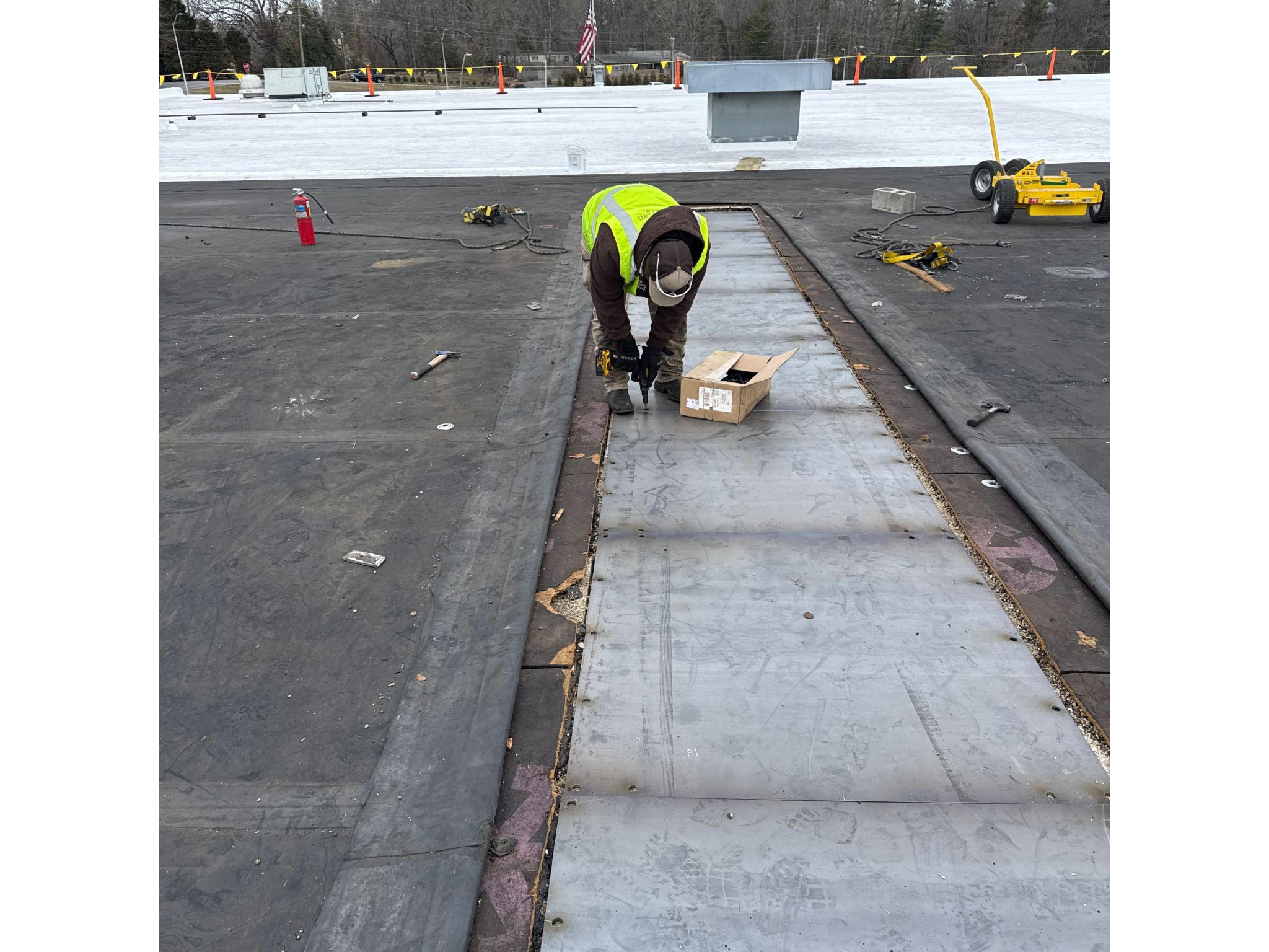 Covering old penetration with new roof decking
