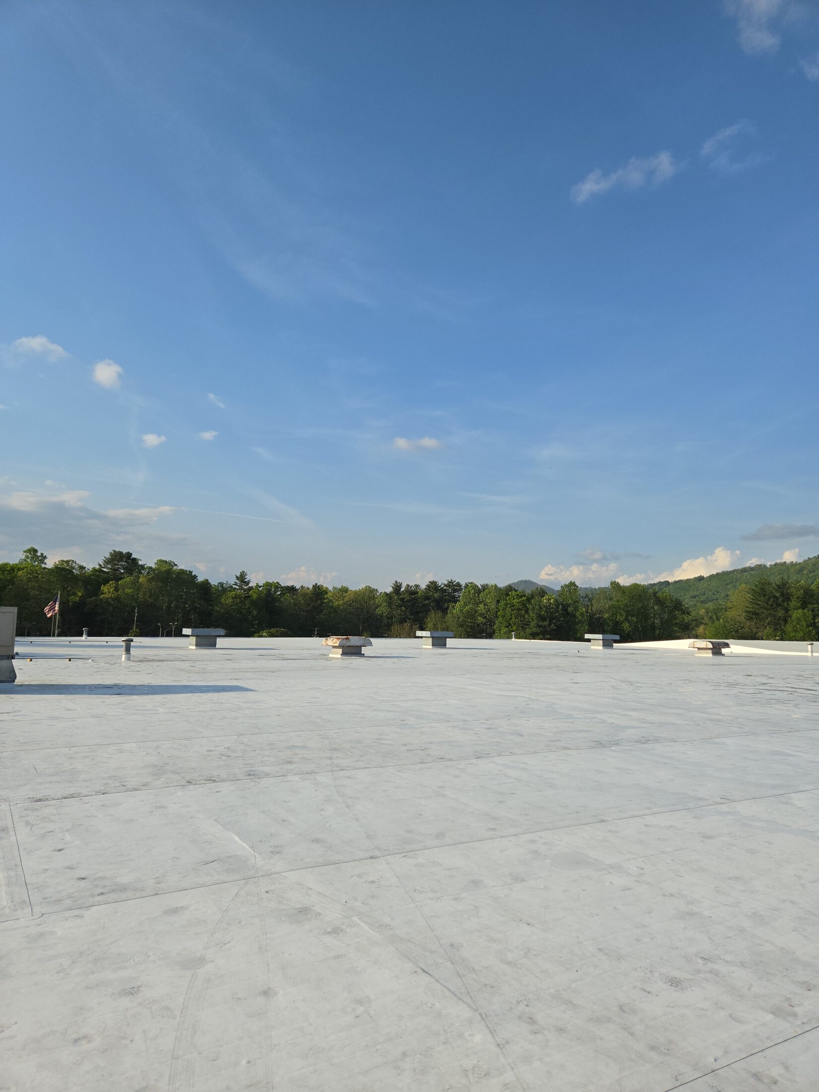 Finished FM GLobal TPO membrane roof that is ready for final cleaning