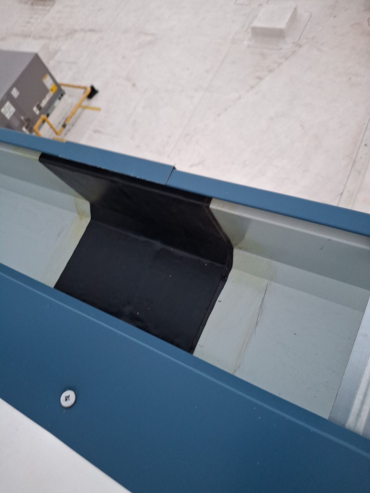 Finished gutter expansion joint detail
