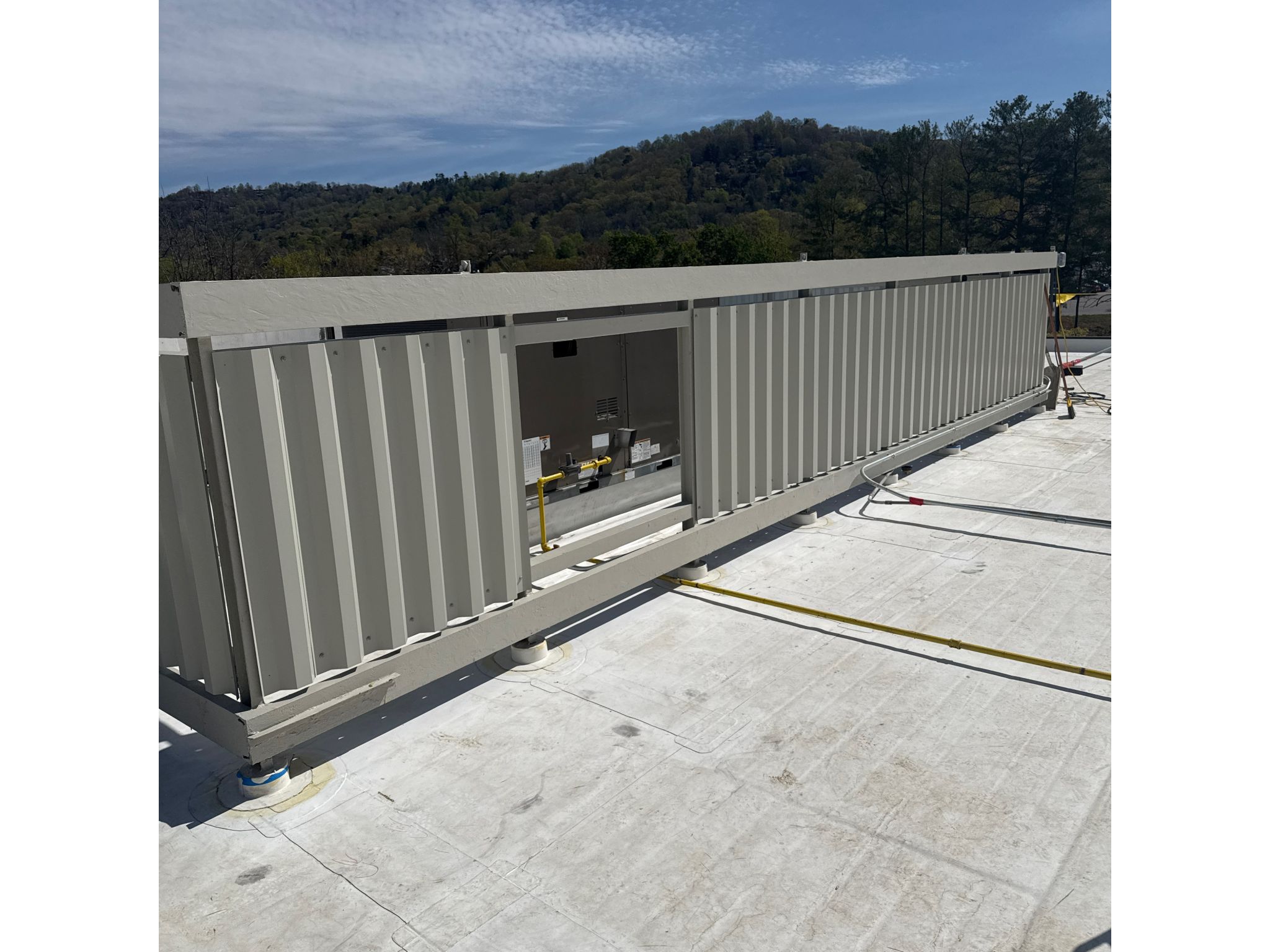 Newly replaced metal screen wall panels