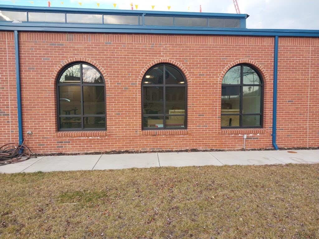 Beautiful newly installed commercial gutters and downspouts.