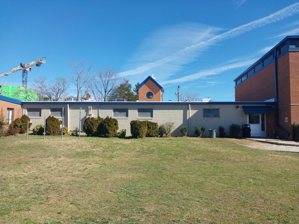 Finished commercial rain gutters at catholic school