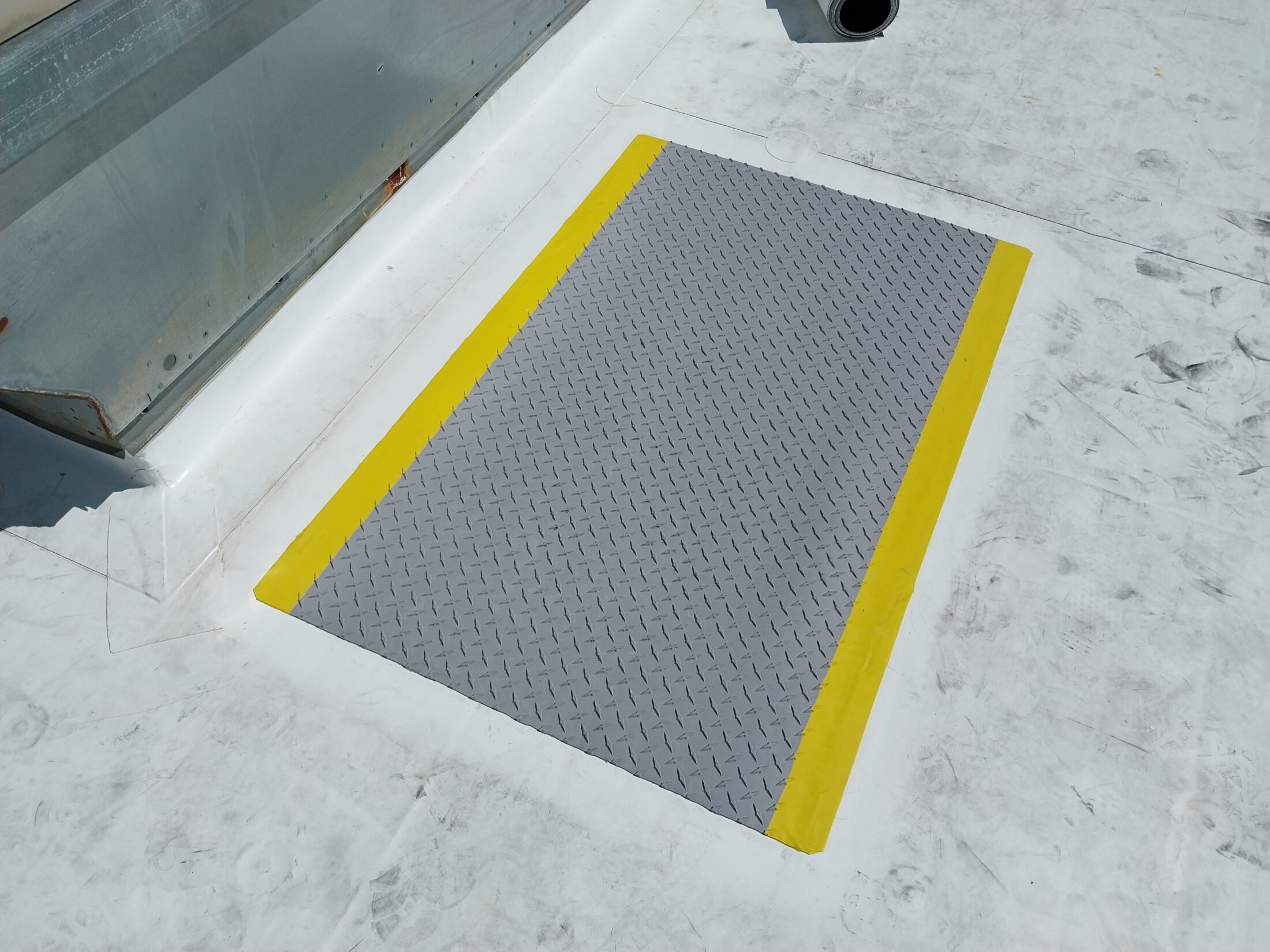 New TPO walkpad on a commercial roof