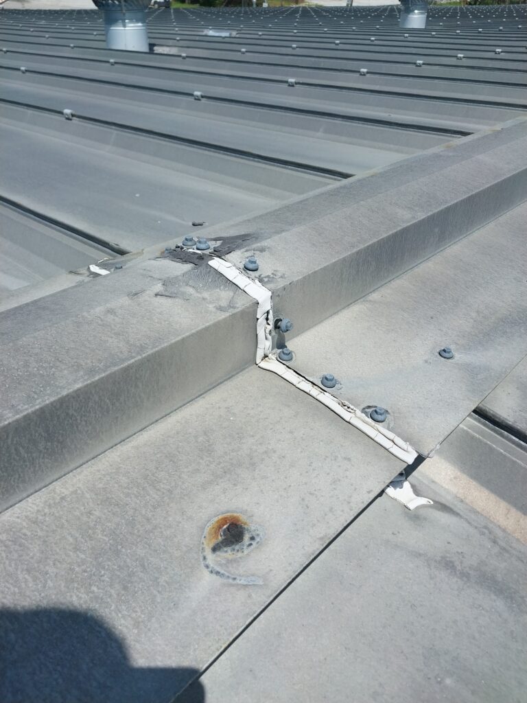 Metal fasteners that are backing out due to thermal expansion.