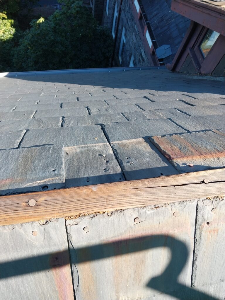 Missing slate roof tile