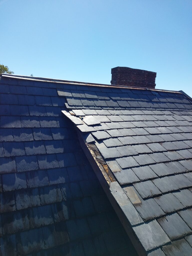Hurricane damaged slate roof section