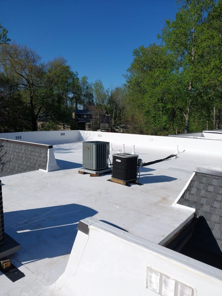 Completed flat roof replacement from bur to tpo