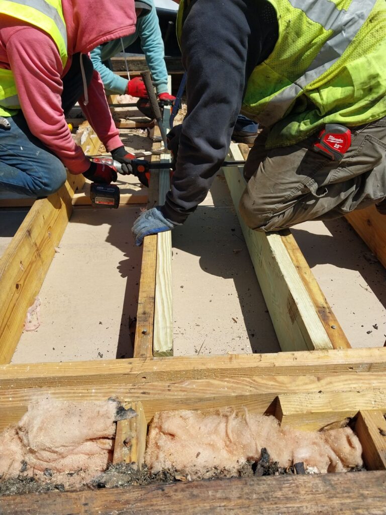 Flat roof beam repairs.