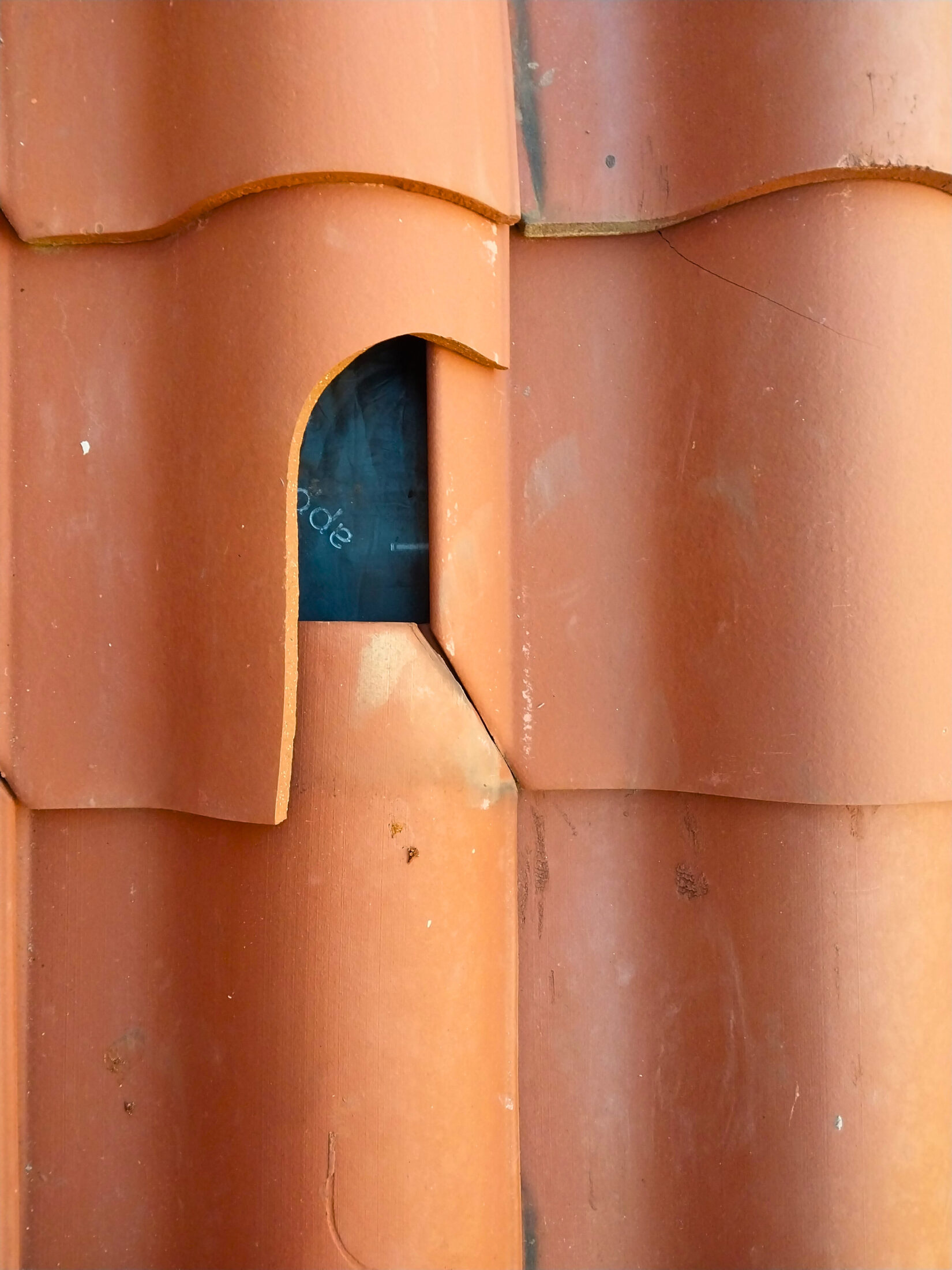 Cracked church roof tile