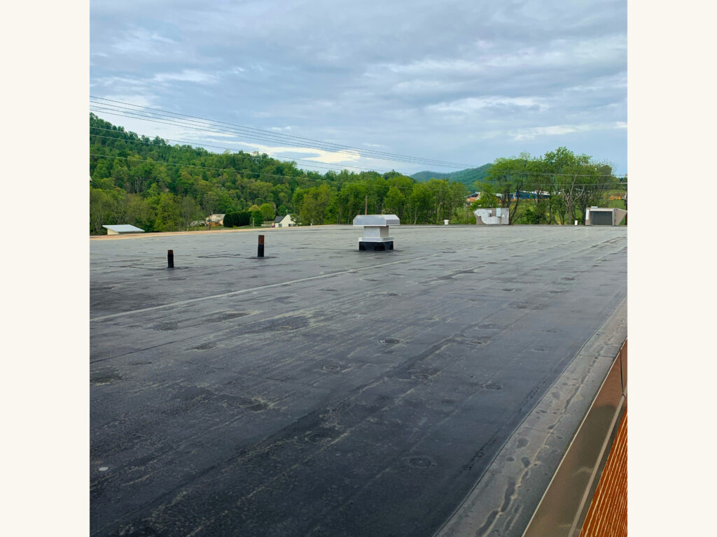 old flat EPDM roof that is about to get recovered