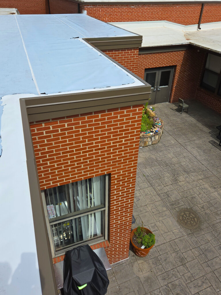 New edge metal on this section of the school